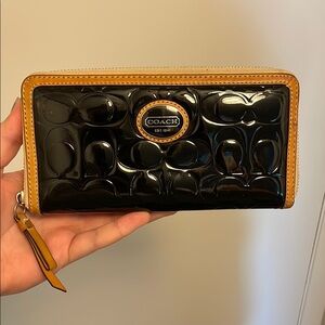 Coach Black and Tan Embossed Patent Wallet